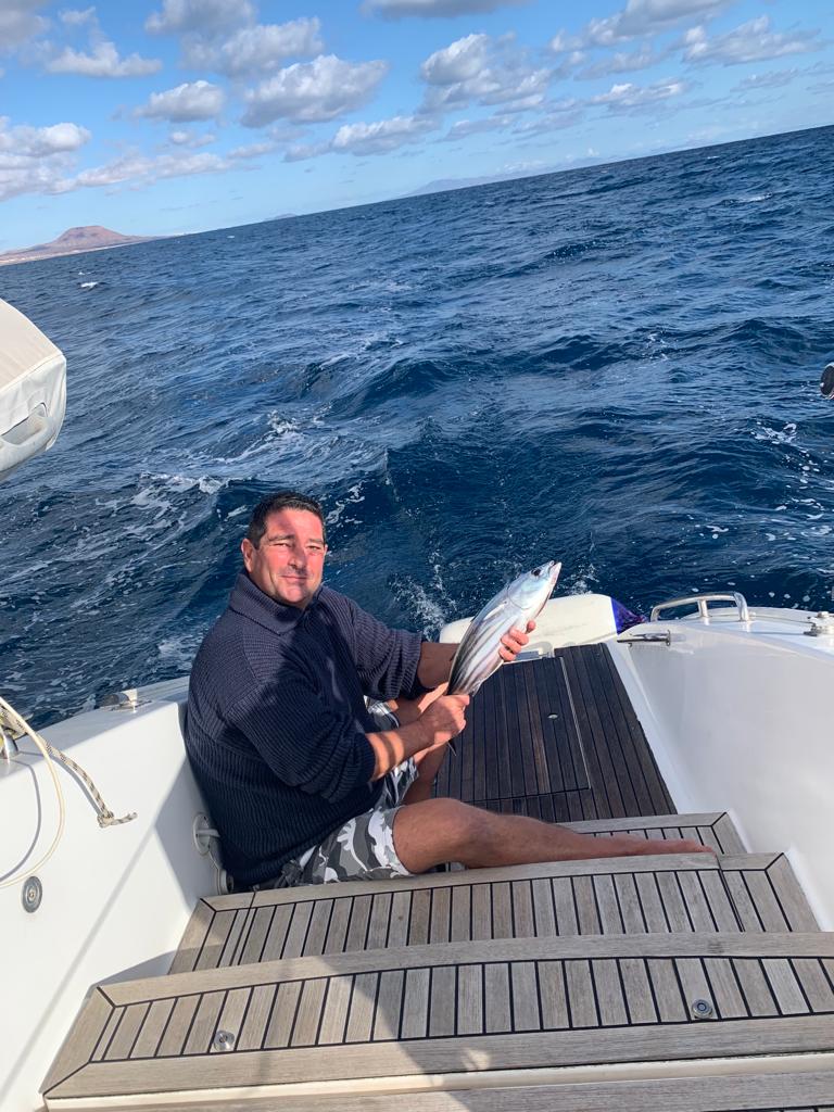 Wolfgang with his first fish – proudly on the port hull