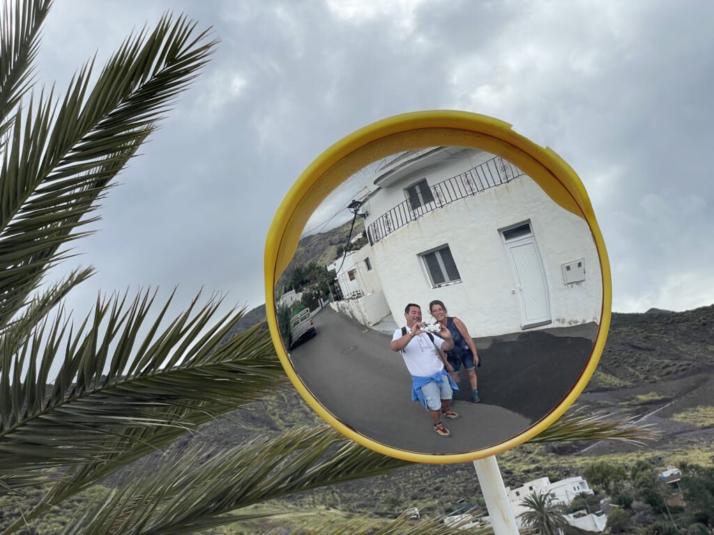 Selfie in a traffic mirror
