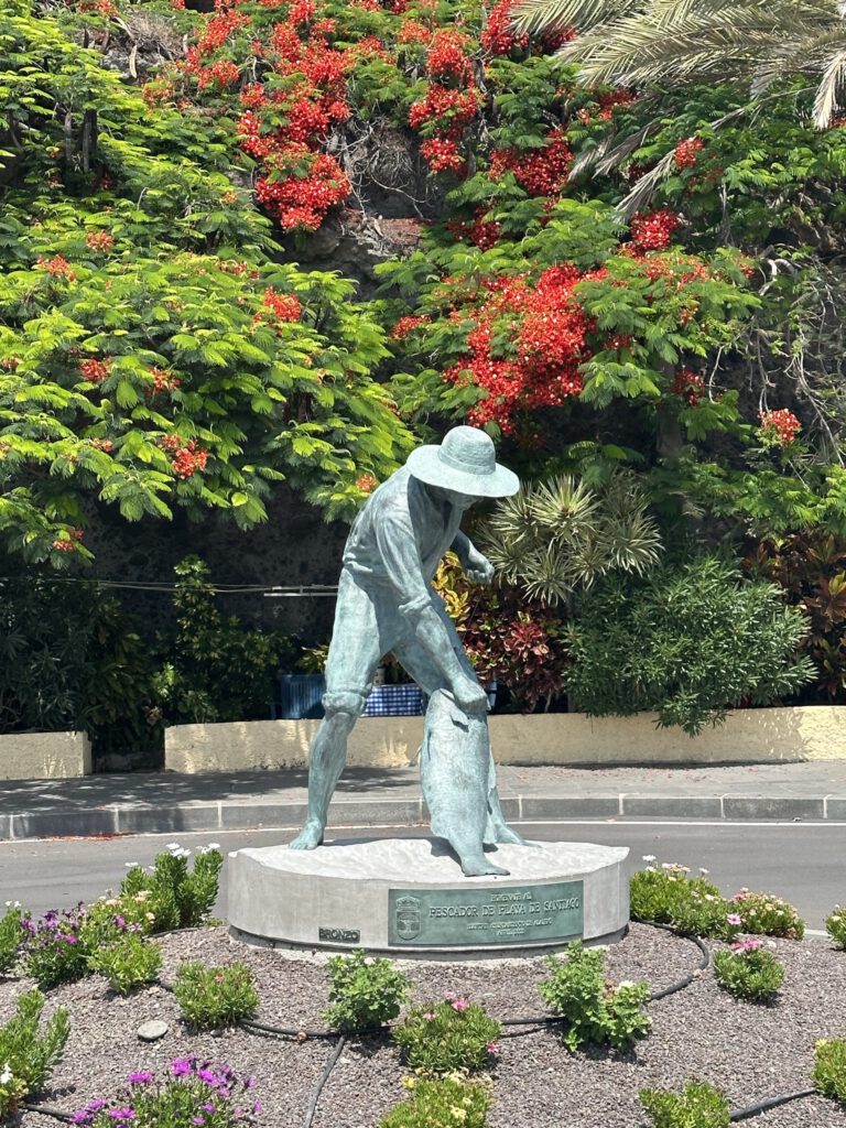A monument under flowering trees